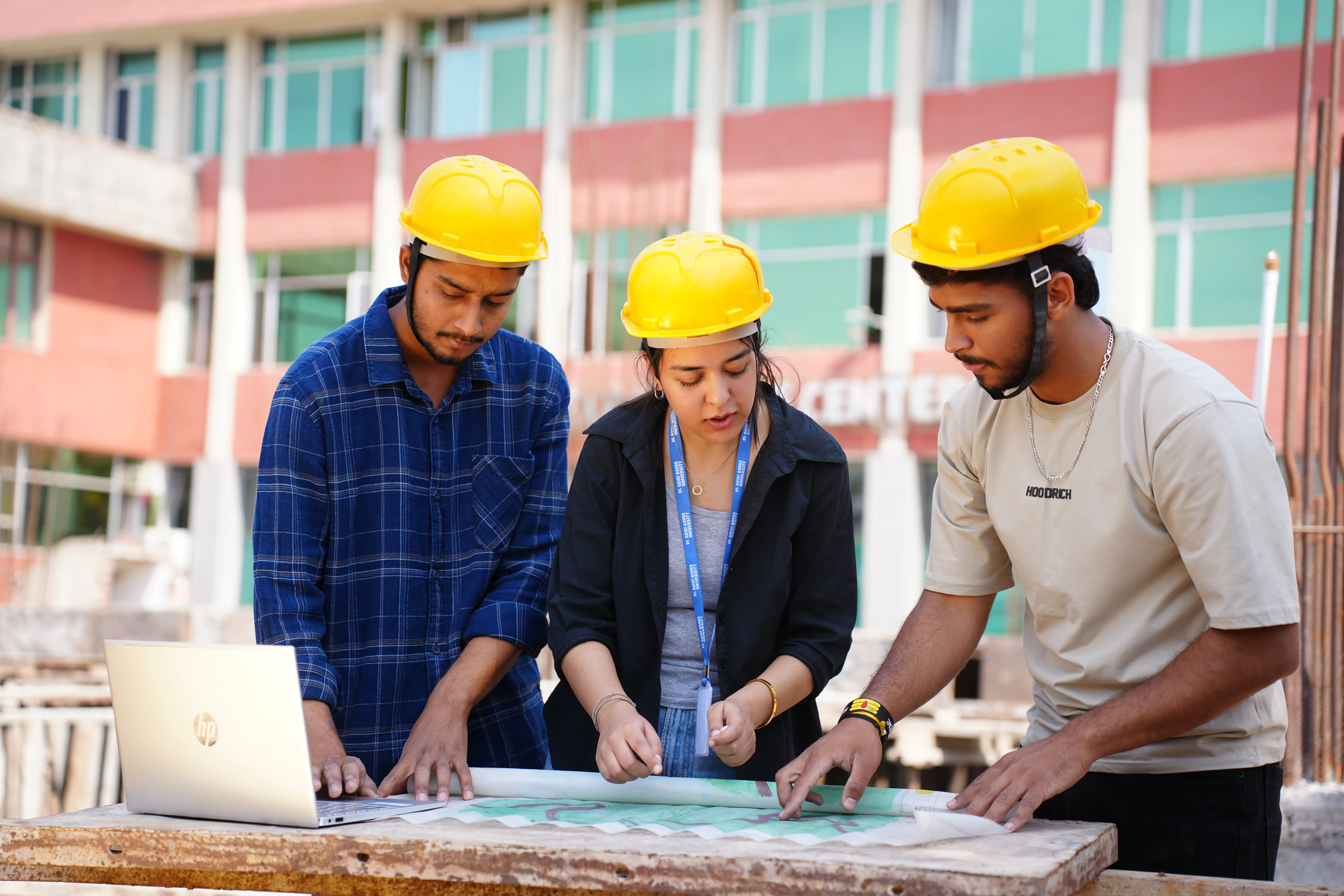 Students working together at a display table